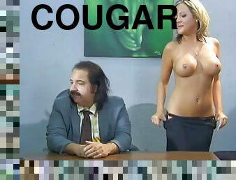 Ardent cougar with a piecing and fake tits getting drilled hardcore on the table