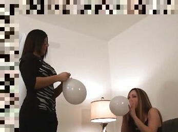 Cute Cougars have fun playing and bubbling balloons in a reality shoot