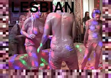 Lusty lesbians wrestling in mud at WAM party