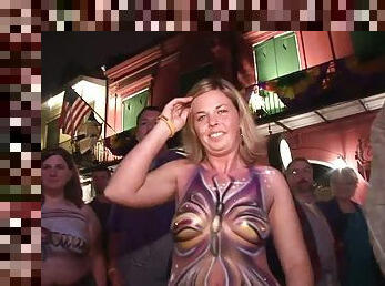 Party girls flashing their tits on the street for beads