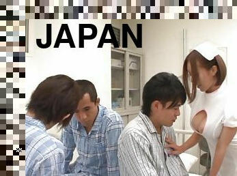 Elegant Japanese nurse with big tits ecstatic as she gives a steamy handjob