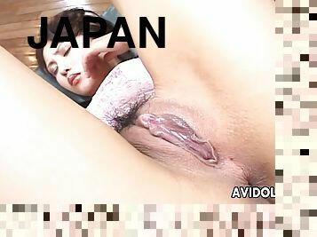 Lovely Japanese gal fingered and stuffed with a large dildo