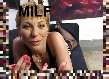 Short-haired blonde milf flashes her shaved twat in backstage vid