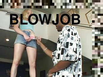 Amber Rain gives a sloppy blowjob and enjoys rough interracial sex