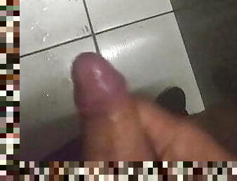 masturbating and cumming in the bathroom of bus station