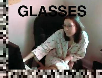 Nerdy girl in glasses watches porn and then gives a blowjob