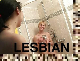 Margarete and Laura have a lesbian sex after taking a shower