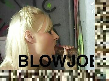 Alanna Thomas enjoys sucking a BBC through a gloryhole
