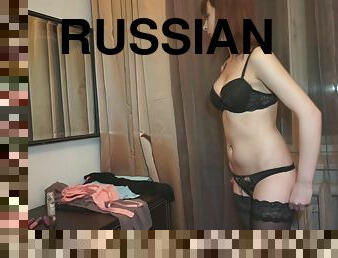 Russian redhead siren in stockings is riding it