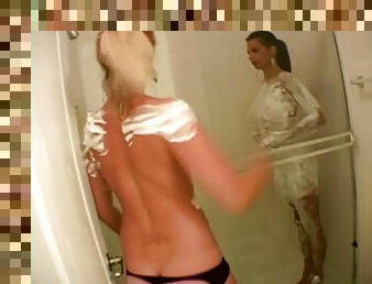 Two luscious chicks get messy in the shower