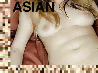 Asian beauty showing her boobs and pussy