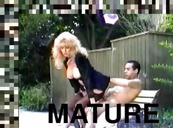 Mature retro blonde Tina Owen blows and gets fucked in the yard