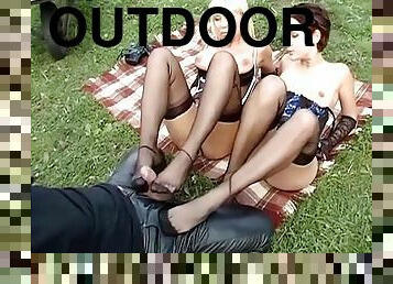 Outdoor threesome with two horny betties