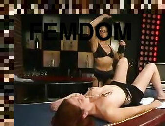 Redhead girl gets her pussy stuffed with a bottle in femdom video