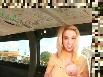 Blonde amateur hottie showing tits in the sex bus