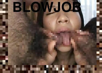 Cute Nozomi Ooishi gives a blowjob to two guys