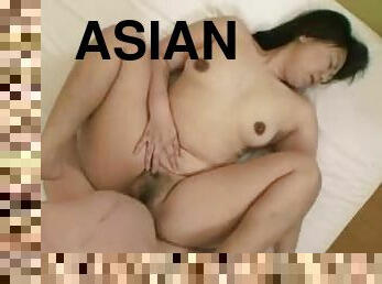 Big-assed Asian milf gets her meaty cunt drilled remarcably well