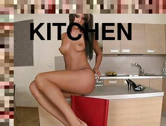 Ashley Bulgari pleases herself with fingering in the kitchen