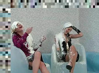 Hot lesbo clothed duo in a pool gets messy with paint