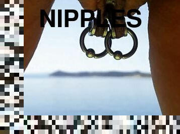 nippleringlover peeing naked at sea flashing large gauge pierced nipples & stretched pussy piercings