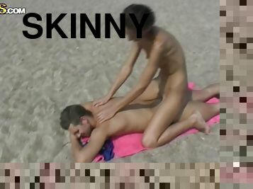 Skinny babe getting fucked deep and hard on the beach