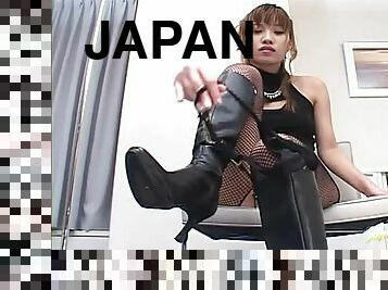 Divine Japanese babe in fishnet stockings rubs herself