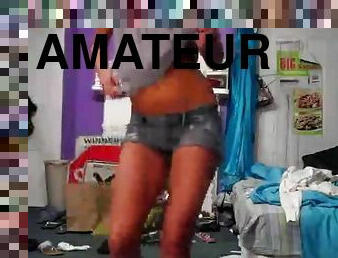Hot chick stripping in her messy room