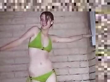 Teen in bikini trying to have a sexy shower