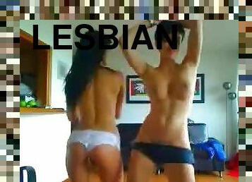 Three lesbians Tease Around Topless In A Bedroom