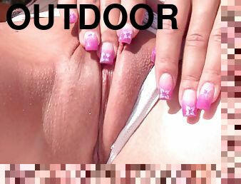 Brunette Teen Fingers Her Wet Pussy Outdoors In The Garden