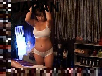 Sexy Japanese masseur gives a handjob and rides like a professional