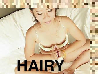 Hairy puss Asian slut Nuna opens her legs to play with a vibrator
