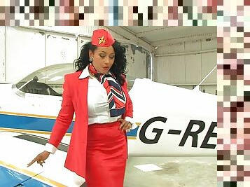 Busty stewardess Danica Collins takes off her panties to tease