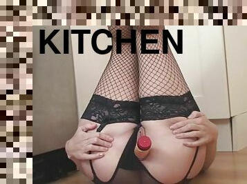 Closeup video of seductive Cheryl B drilling her cunt in the kitchen