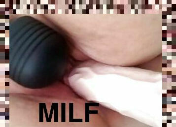 Filling my pussy with my favorite toy.