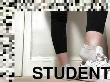 Student showing her stan smiths and socks