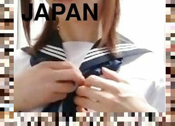 Japanese Crossdresser takes off Sailor School Uniform