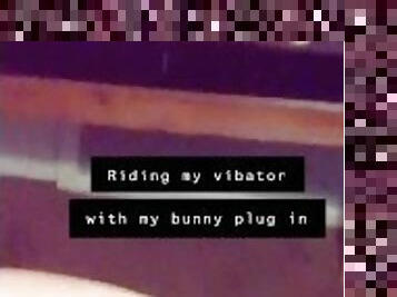 Fat girl riding vibrator with bunny ass plug