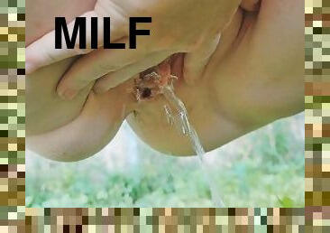 Hot Pissy MILF sprays her golden nectar everywhere!