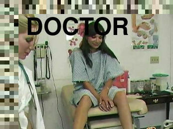 A nurse fingers and vibrators her pussy in the doctor's office