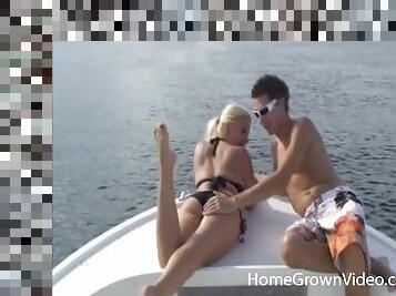 Amazing blonde gives her head for a blowjob and fucks hard on a boat