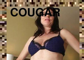 Sexy cougar with long dark hair getting her shaved pussy licked