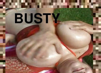 Two busty skanks ride their BF's schlongs in the yard