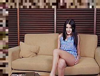 Adorable brunette teen masturbates on sofa solo