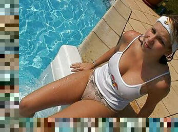 Busty teen cooling down in the pool and toying with her twat