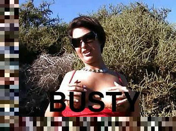 Busty Brunette MILF Gets Very Horny on a Nude Beach