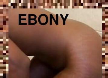 Ebony sticks dildo on wall