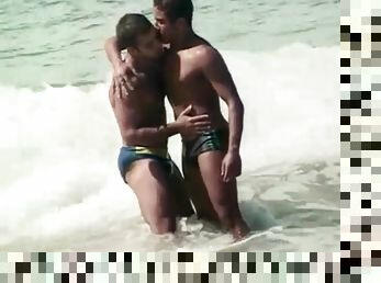 Latin hotties sucking dick on an empty beach