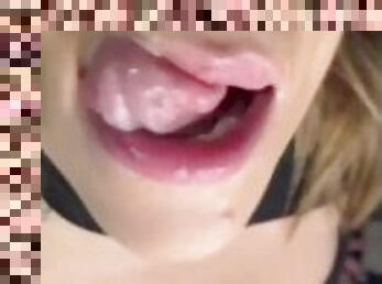 Your giantess Ashley shows you the inside of her mouth and makes sounds like she's giving you a blow
