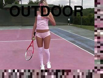 In the middle of the tennis court she gets naked and fingers